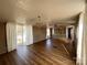 Spacious living room with hardwood floors and sliding glass doors at 3610 Becky Ln, Monroe, NC 28112