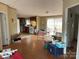 Combined kitchen and dining area with access to deck at 372 Forest Hollow Dr, Statesville, NC 28677
