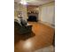 Living room with laminate floors, stone fireplace, and large window at 372 Forest Hollow Dr, Statesville, NC 28677