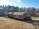 Brick ranch house with a wraparound porch at 4539 Sapp Rd, Kannapolis, NC 28083