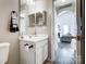 Bathroom features a vanity and a view into living room at 5113 Park Place Dr, Dallas, NC 28034