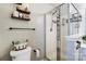 Bathroom with shower, toilet and shelf at 5113 Park Place Dr, Dallas, NC 28034