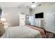 Serene bedroom with a metal bed frame, dresser, and ensuite bathroom at 5113 Park Place Dr, Dallas, NC 28034