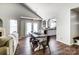 Farmhouse dining area with hardwood floors and access to the backyard at 5113 Park Place Dr, Dallas, NC 28034