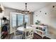 Bright dining area with white table and chairs, and a bay window at 5113 Park Place Dr, Dallas, NC 28034
