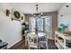 Charming dining area with white table and chairs, and a bay window at 5113 Park Place Dr, Dallas, NC 28034
