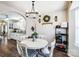 Cozy dining area with white table and chairs near the kitchen at 5113 Park Place Dr, Dallas, NC 28034
