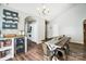 Farmhouse style dining table with bench seating in open concept dining area at 5113 Park Place Dr, Dallas, NC 28034