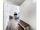 Bright entryway with hardwood floors and a wooden bench at 5113 Park Place Dr, Dallas, NC 28034