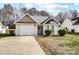 One-story house with attached garage and a small front yard at 5113 Park Place Dr, Dallas, NC 28034