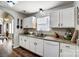 White kitchen with granite countertops and stainless steel appliances at 5113 Park Place Dr, Dallas, NC 28034