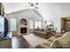 Open concept living room with a fireplace and hardwood floors at 5113 Park Place Dr, Dallas, NC 28034