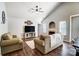 Living room with vaulted ceiling, fireplace, and hardwood floors at 5113 Park Place Dr, Dallas, NC 28034