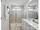 Modern bathroom with glass-enclosed shower and a sleek white vanity at 604 Cassidy Ct, Clover, SC 29710