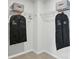 Walk-in closet with wire shelving and clothing covers at 604 Cassidy Ct, Clover, SC 29710