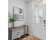 Bright entryway featuring a console table, stylish decor, and a clear view of the front door at 604 Cassidy Ct, Clover, SC 29710