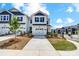 Charming two-story home with a well-manicured front yard and inviting driveway at 604 Cassidy Ct, Clover, SC 29710