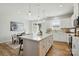 Beautiful kitchen showcasing an oversized island, modern pendant lights, and stainless steel appliances at 604 Cassidy Ct, Clover, SC 29710