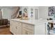 Modern kitchen with island, complete with white quartz countertops and sleek hardware at 604 Cassidy Ct, Clover, SC 29710