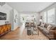Spacious living room showcasing hardwood floors and an open concept layout to the kitchen at 604 Cassidy Ct, Clover, SC 29710