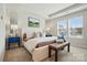 Serene main bedroom with tray ceilings, natural light, and stylish decor with modern furniture at 604 Cassidy Ct, Clover, SC 29710