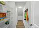 Walk-in pantry featuring wire shelving for ample storage and modern wood floors at 604 Cassidy Ct, Clover, SC 29710