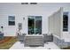Covered patio with outdoor seating near the sliding glass door at 604 Cassidy Ct, Clover, SC 29710