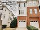 Brick front exterior of townhome with attached garage at 6726 Mallard Park Dr, Charlotte, NC 28262