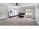 Upstairs Bonus Room with Treadmill, Futon and Natural Lighting at 712 Springwood Dr, Waxhaw, NC 28173