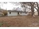 Spacious backyard with mature trees and ample space for outdoor activities at 809 Miller St, Gastonia, NC 28052