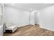 Spacious bedroom with light flooring and access to hallway at 809 Miller St, Gastonia, NC 28052