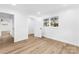 Bright bedroom with hardwood floors and access to hallway at 809 Miller St, Gastonia, NC 28052