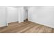 Bright bedroom with hardwood floors and closet at 809 Miller St, Gastonia, NC 28052