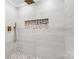 Modern shower with pebble tile accent and rainfall shower head at 809 Miller St, Gastonia, NC 28052