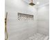 Modern shower with pebble tile accent and rainfall shower head at 809 Miller St, Gastonia, NC 28052