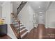 Bright foyer with hardwood floors and staircase leading to the second floor at 840 Pecan Tree Ln, Fort Mill, SC 29715