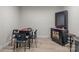 This game room has an arcade game and table with chairs at 840 Pecan Tree Ln, Fort Mill, SC 29715