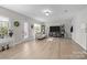 This living room is spacious with lots of light and furniture at 840 Pecan Tree Ln, Fort Mill, SC 29715