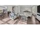 Bright living room featuring hardwood floors, comfortable seating and open floor plan at 840 Pecan Tree Ln, Fort Mill, SC 29715