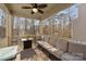 Cozy screened porch with ceiling fan and comfortable seating, great for relaxing outdoors at 840 Pecan Tree Ln, Fort Mill, SC 29715