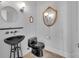 Modern powder room featuring a unique vessel sink and toilet at 1077 Gauguin Ln, Tega Cay, SC 29708