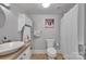 Bathroom features a shower with curtain and neutral walls at 1077 Gauguin Ln, Tega Cay, SC 29708