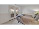 Bedroom features carpet floors, neutral walls, and walkout access to balcony at 1077 Gauguin Ln, Tega Cay, SC 29708