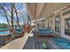 Inviting deck with cozy seating and scenic lake views, ideal for enjoying the outdoors year-round at 1077 Gauguin Ln, Tega Cay, SC 29708