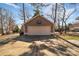 Spacious detached garage with a basketball hoop, ideal for parking and recreational activities at 1077 Gauguin Ln, Tega Cay, SC 29708