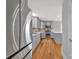 Spacious kitchen with stainless steel fridge and lots of natural light at 1077 Gauguin Ln, Tega Cay, SC 29708