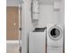 Functional laundry room with modern washer and dryer units at 1077 Gauguin Ln, Tega Cay, SC 29708