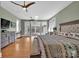 Large main bedroom with private access to porch with nature views at 1077 Gauguin Ln, Tega Cay, SC 29708