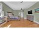 Large main bedroom with lots of windows and hard wood floors at 1077 Gauguin Ln, Tega Cay, SC 29708