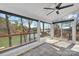 Relaxing sunroom/porch with lake views and lots of natural light at 1077 Gauguin Ln, Tega Cay, SC 29708
